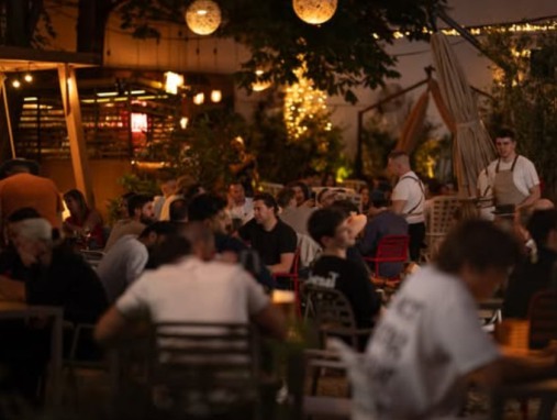 Guests enjoying the restaurant in the evening